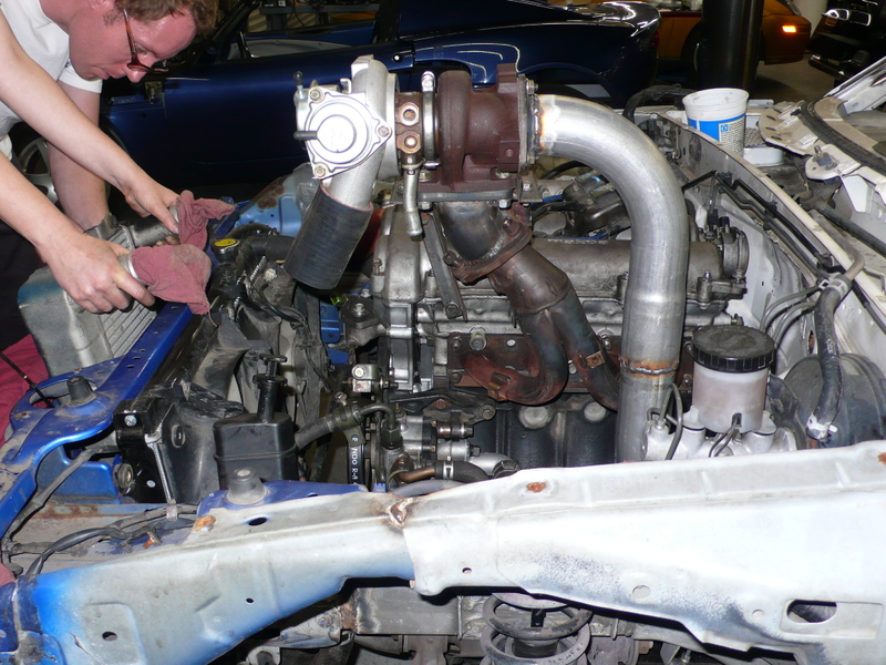 Illustration for article titled Eyesore Racing's Ghettocharged Miata Fears No Turbocharged Peugeot Surrender Monkeys!